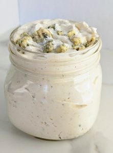 The BEST homemade Blue Cheese Dressing and Dip. A secret ingredient sets it apart from the rest and takes this blue cheese dressing to a whole other level! Perfect for dipping chips, fries, or on top of salad.